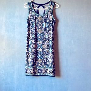 Sleeveless summer dress with back cut out.